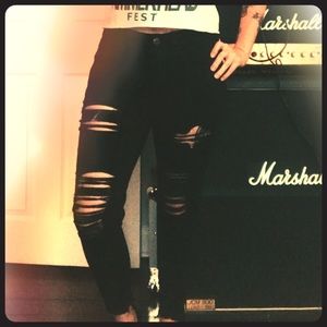 Black distressed American Eagle jeans.